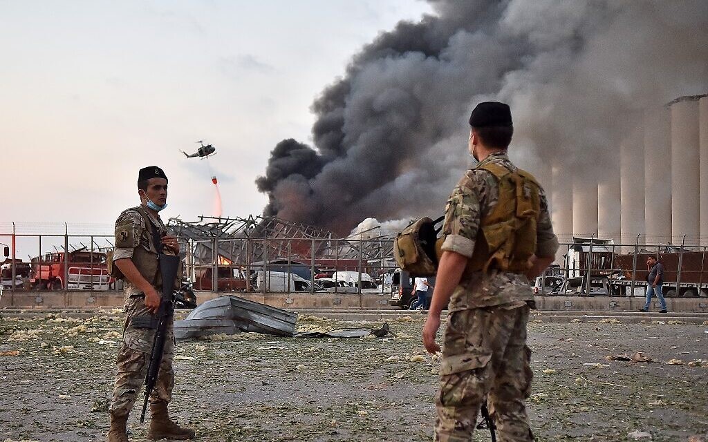 Soldiers watch bomb explodes Helplessly