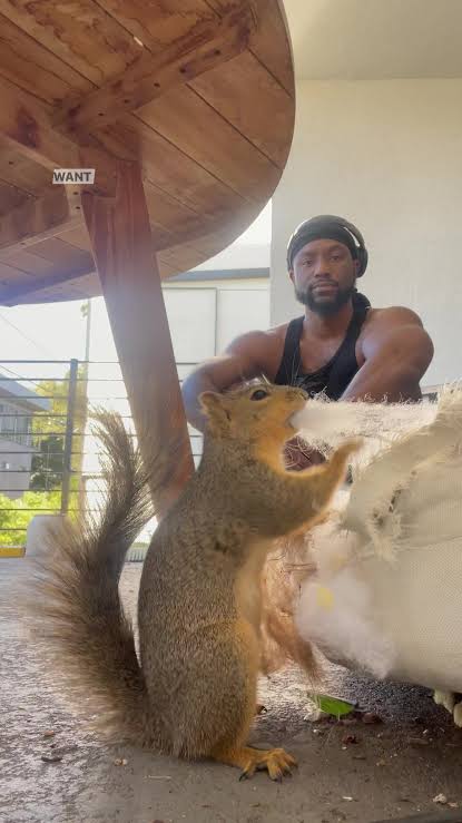 Derrick Downey Jr., and his cute little squirrel, Richard. 