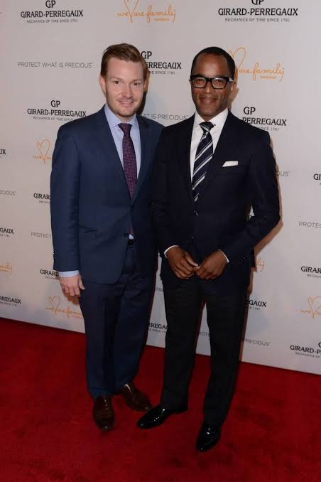 Nick Schmit and his spouse, Jonathan Capehart, at an award event. 