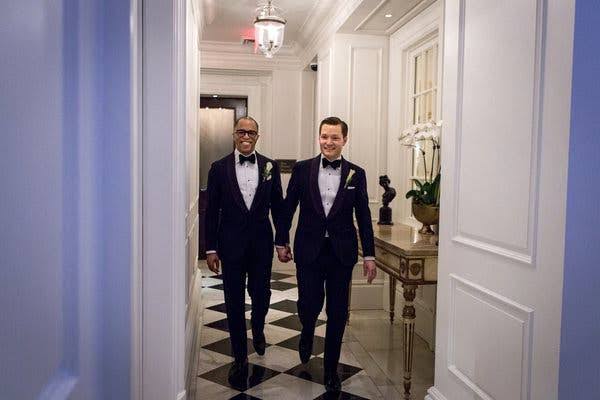 Nick and his then-boyfriend and now-husband, Jonathan Capehart, during their wedding party. 