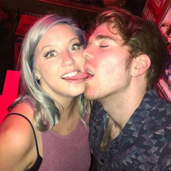 Shane Dawson and Lily Marston locking lips. 