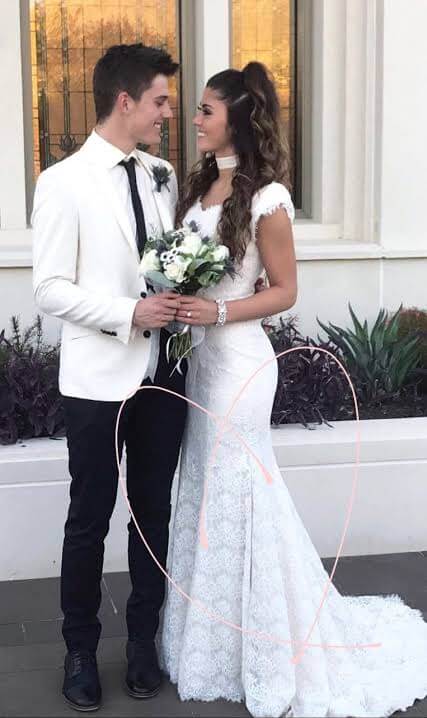 Kenny-Holland-and-his-wife-Nicole-Mitchell-on-their-wedding-day.-