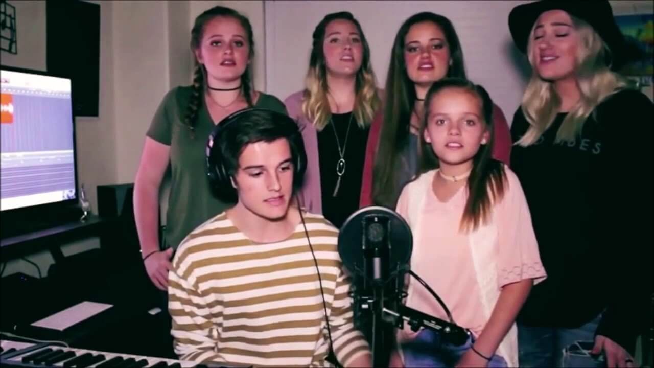 Capri Holland with her older brother, Kenny Holland, and four sisters, in a snippet from October 2017. 