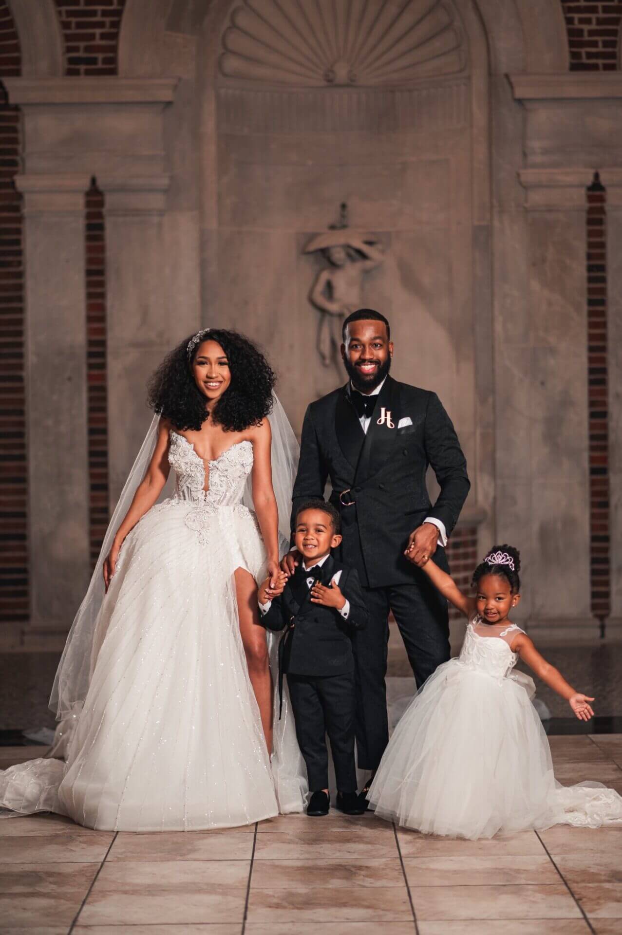 Image - Jayla Henry with her husband, Tony, and two children, Braylon and Nyla, on their wedding anniversary. 