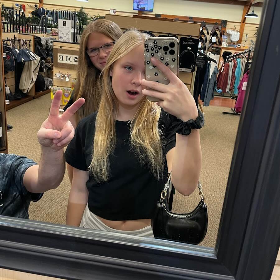 Image - Madison Crist with her mom, in a mirror picture. 