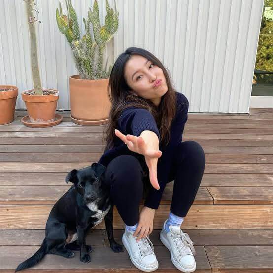 Chinese-American YouTuber, Olivia Sui, with her pet dog, Grizzy. 