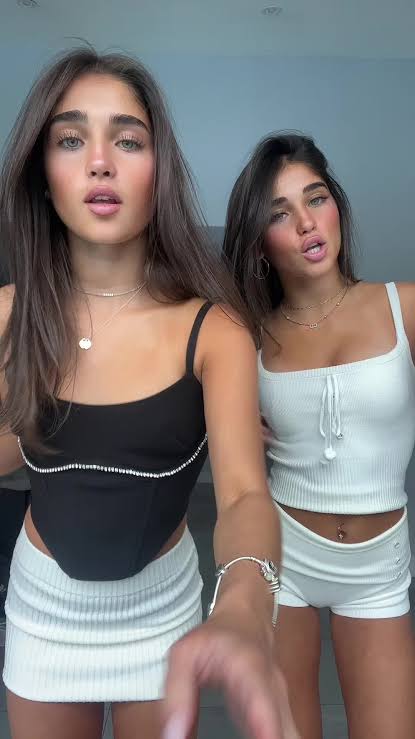 Sienna Walker doing a TikTok with her twin sister, Keira Walker. 