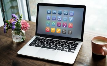 Laptop on a wooden table